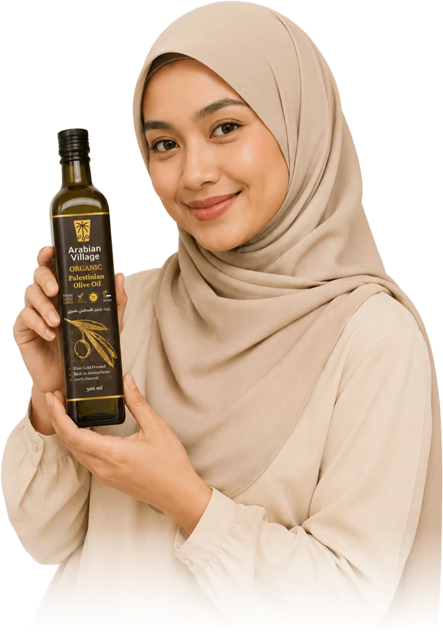 Woman holding a bottle of Arabian Village organic Palestinian olive oil